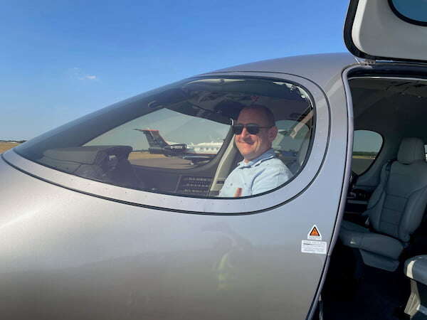 Matthew Stibbe in the cockpit of a Cirrus Jet